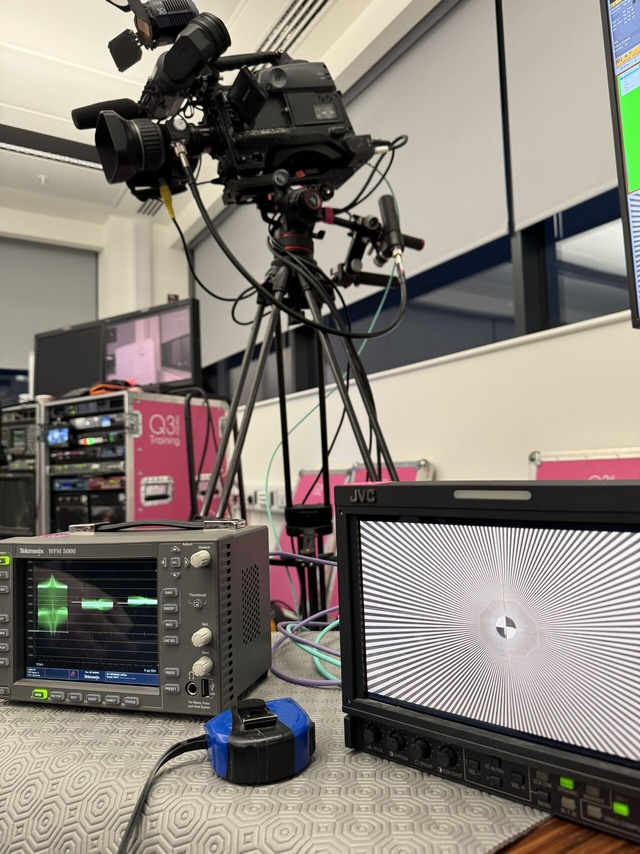 Practical - Broadcast Camera Alignment Tek waveform monitor and portable JVC monitor showing siemens star with camera on tripod visible behind